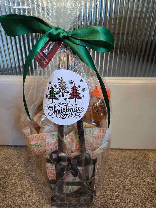 Holiday Gift Basket with green ribbon, honey, and handmade soap